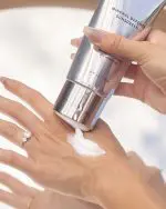 Sheer lightweight mineral SPF 30+ for face and body with coconut scent