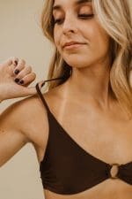Sjolie Aloe No.9 spray tan result showing natural tan lines - Clear Spray Tan