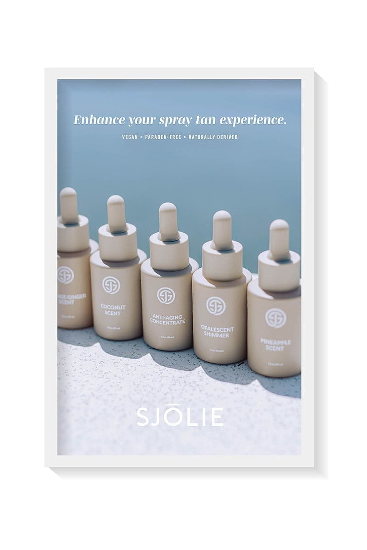 SJOLIE Enhance Your Tan poster with additive dropper bottles on the sand