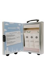 SJOLIE Glow on the Go Travel Set opened like a suitcase, with travel-size Body Renew, Shower Gel and Tan Extend