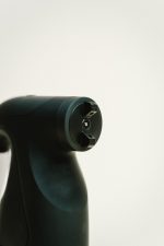 Close-up detail of the nozzle on the Sjolie handheld spray tan gun