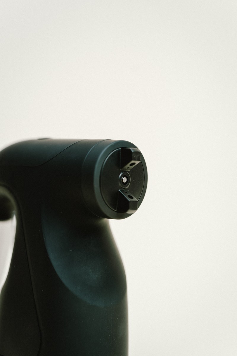 Close-up detail of the nozzle on the Sjolie handheld spray tan gun