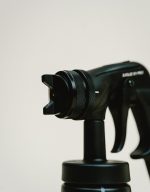 Adjustable fan pattern air cap on the Sjolie X1 Pro HVLP spray tan gun