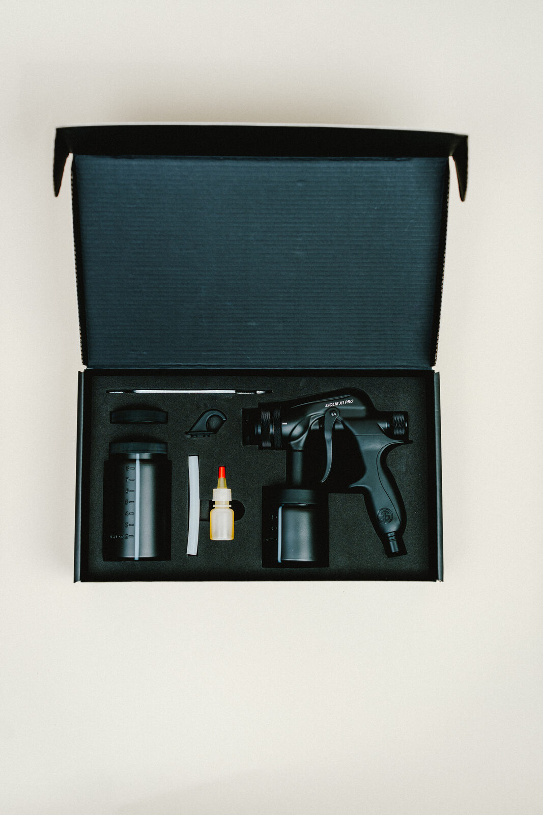 Sjolie X1 Pro applicator kit foam-packed in black box